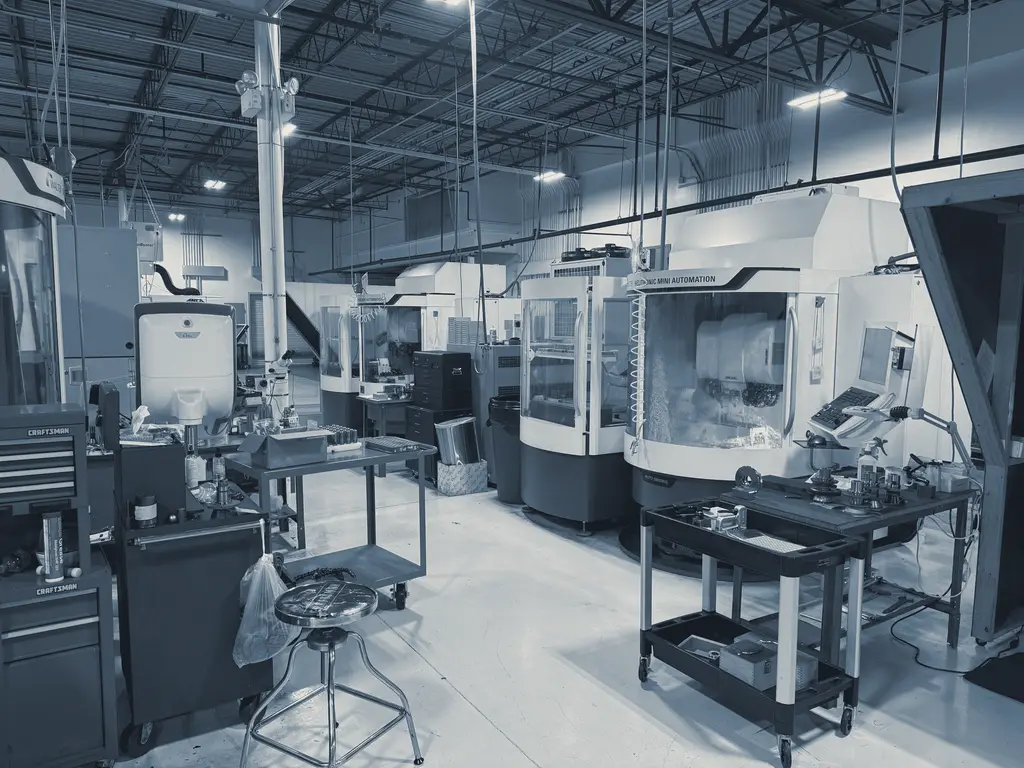 CNC machines and metalworking tools in a manufacturing workshop